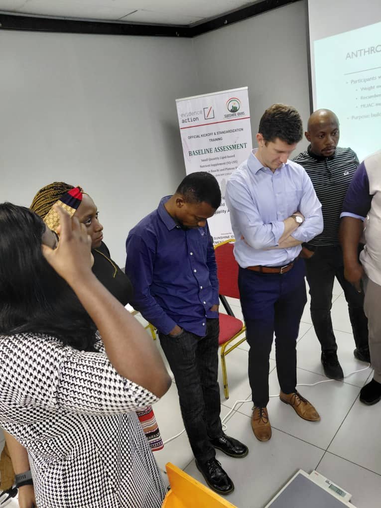 Colleagues working through a research standardisation exercise